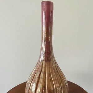Vintage ribbed ceramic vase with an iridescent purple and bronze Glaze,